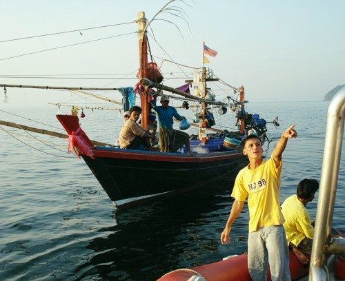 deal with a Moken boat